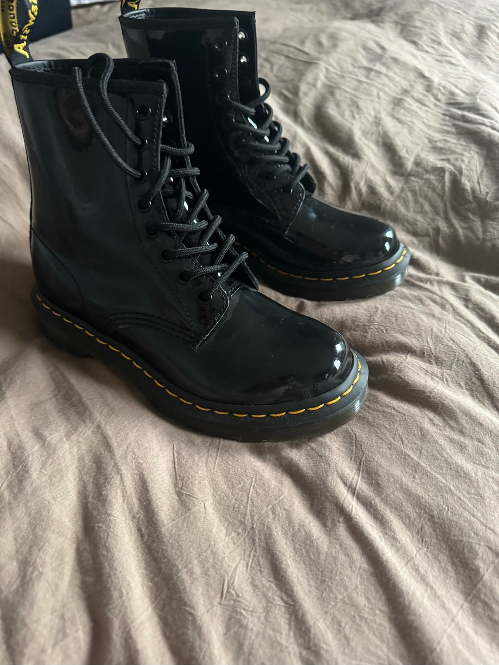 Dr. Martens Black Patent Combat Boots with Yellow Stitching